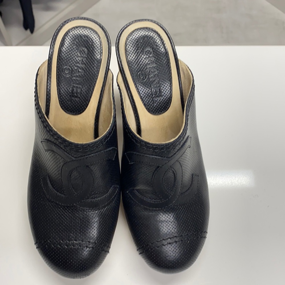 Chanel Black leather and wooden clogs